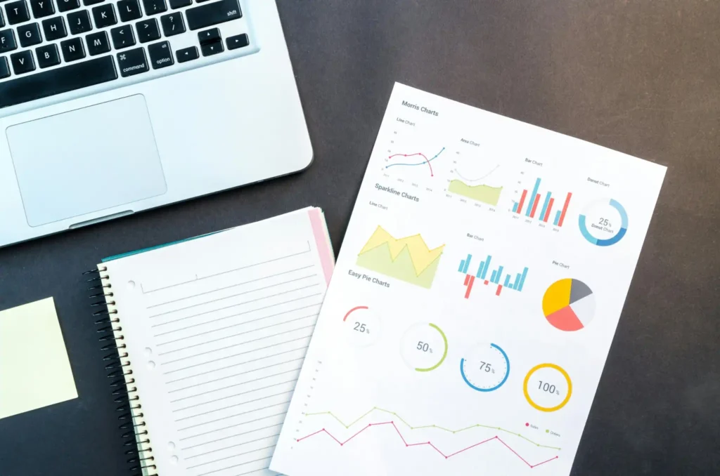 How to Start SEO for School Website Without Experience SEO report and notebook on desk representing school website strategy planning
