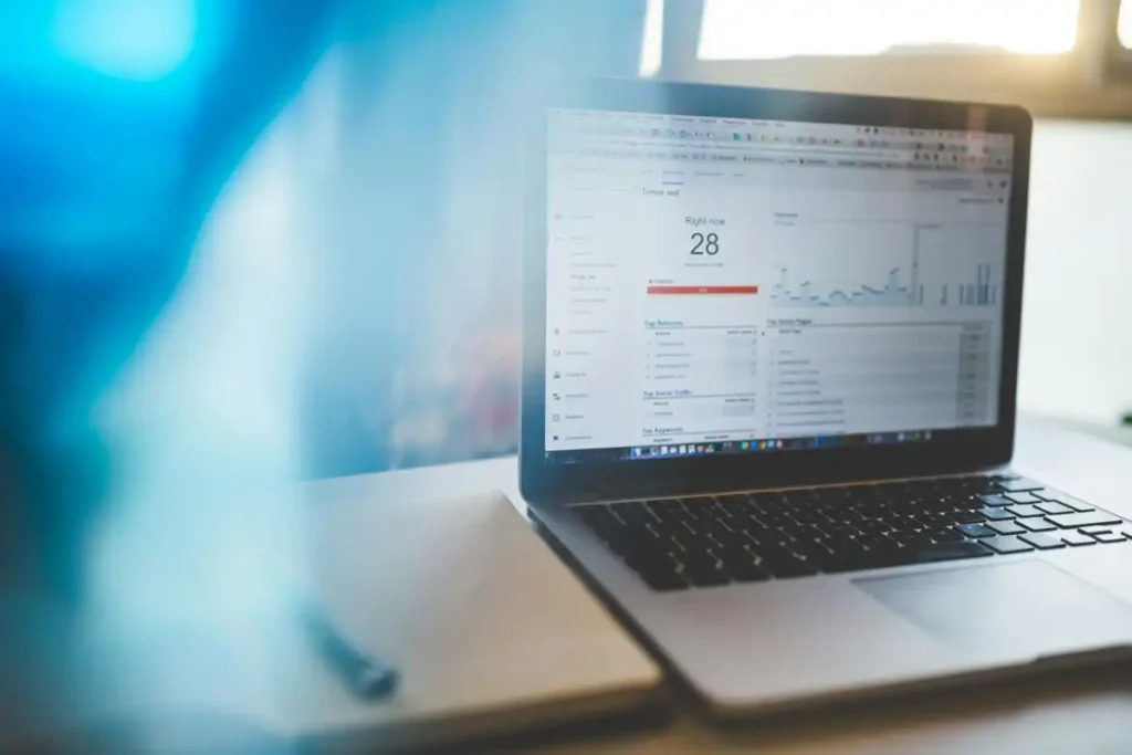 School Website SEO Analytics Dashboard Analytics dashboard on laptop screen showing school website SEO performance